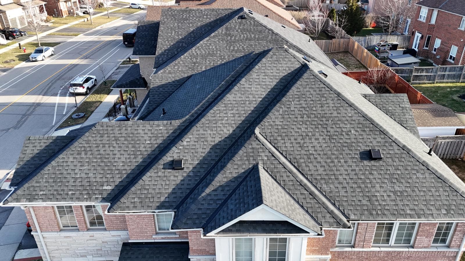 Aerial drone view of a residential roof replacement in Mississauga